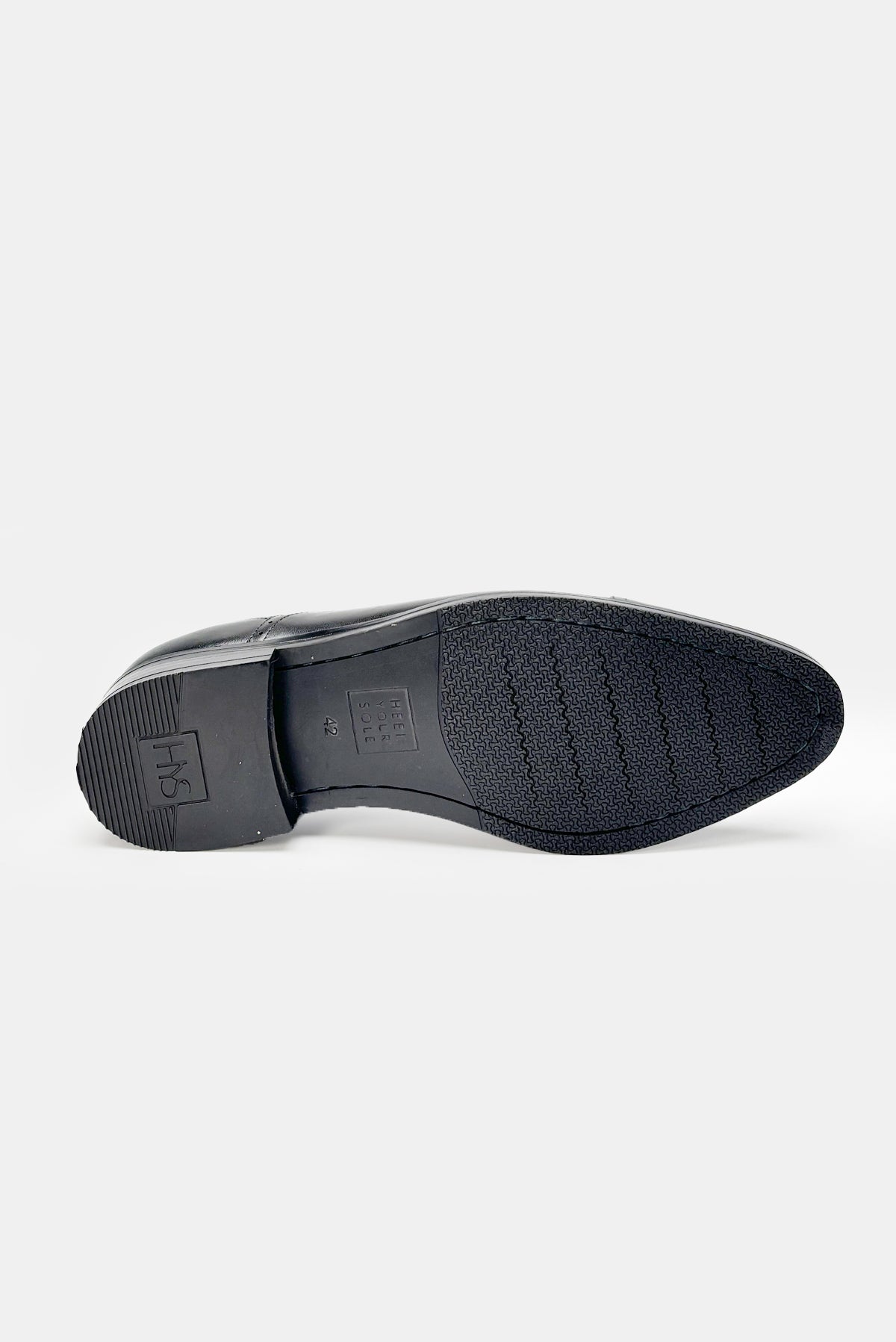 Black shoe sole on a white background